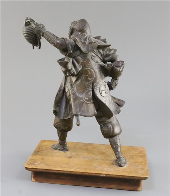 A Japanese bronze figure of a Samurai, Meiji period, total height 28cm